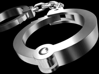 handcuffs-contraband-cell-phone